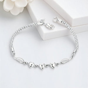 Stylish Silver-Plated Minimalist Heart-and-Feather Bracelet For Women.